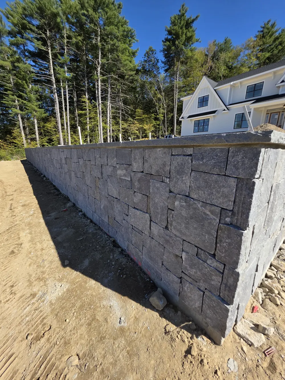 Freestanding Stone Wall — stone & veneer by Honorato Construction