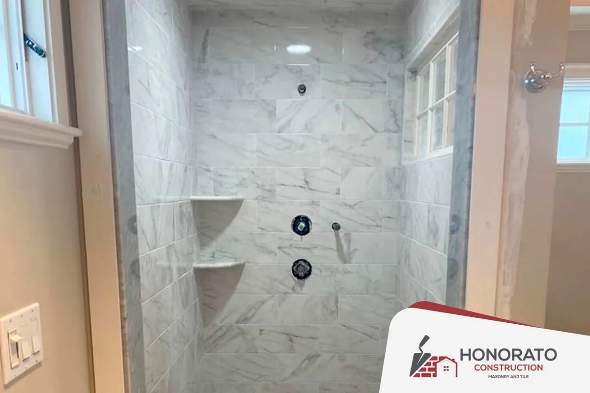 Marble Tile Shower — tile & bath by Honorato Construction