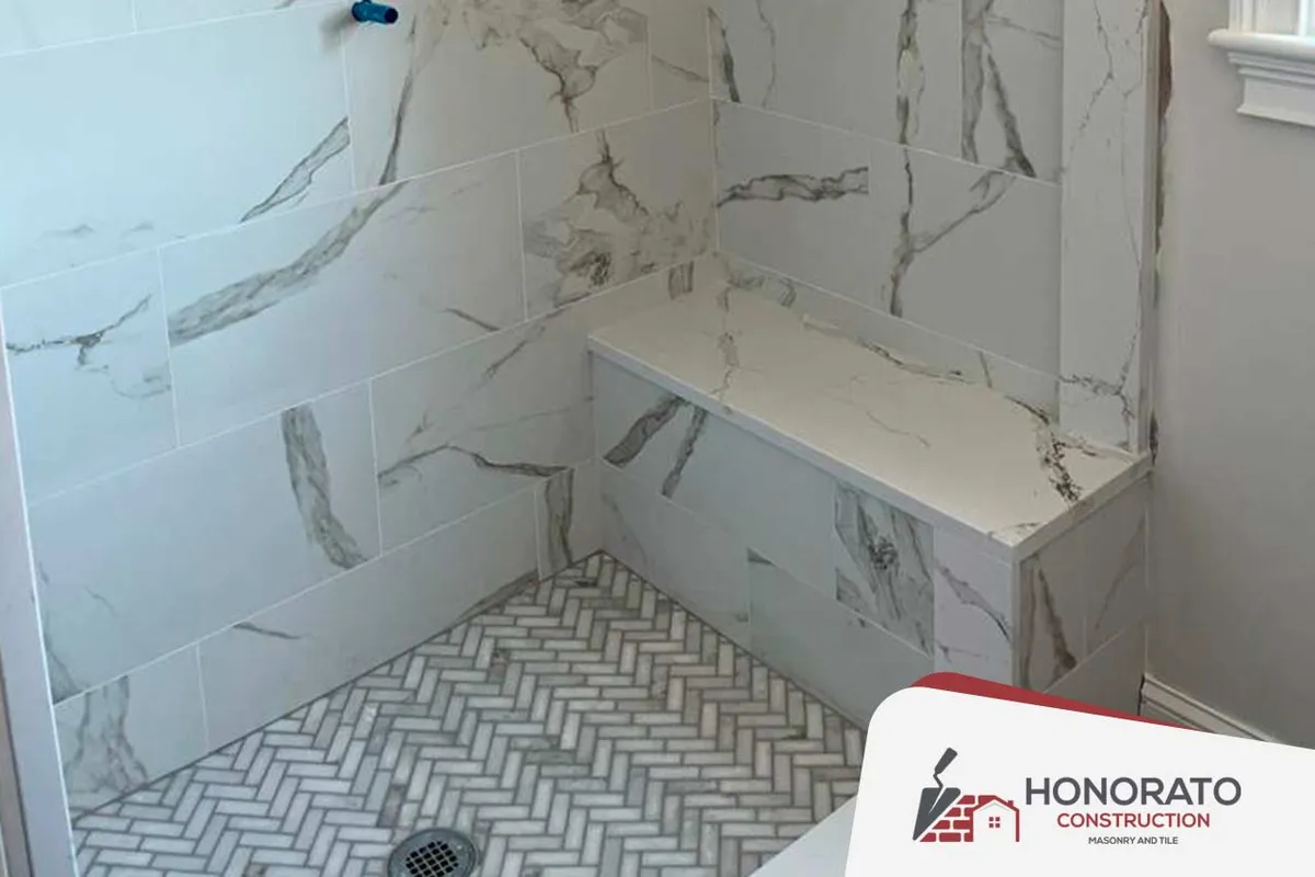 Marble Shower & Bench — tile & bath by Honorato Construction